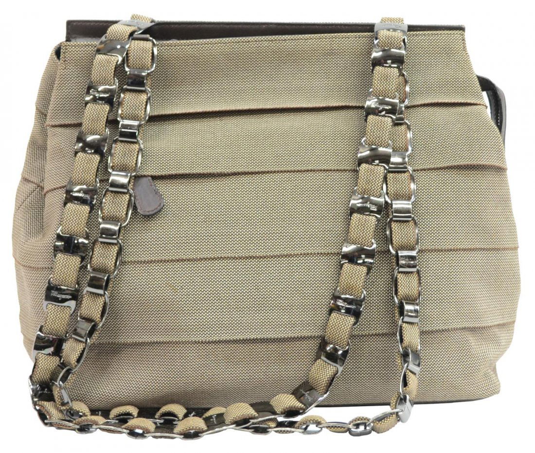 SALVATORE FERRAGAMO BROWN CANVAS SHOULDER BAG: Salvatore Ferragamo shoulder bag in brown canvas, dark silver hardware, front zip opening to large pocket, top zipper opening to dark brown patterned lined interior with single zip side pocket, nonadj