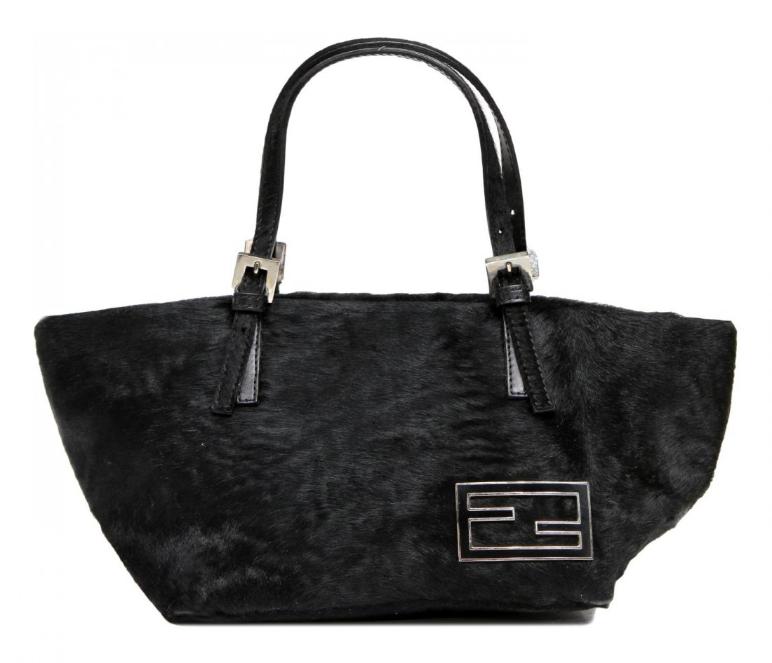 FENDI BLACK PONY HAIR AND LEATHER HANDLE PURSE: Fendi handbag in black pony hair, silver toned hardware, top zip opening to orange lined interior with single zip pocket, accompanied by original dust bag, bag: approx 5.25"h, 12.75"w, .5lb total Star