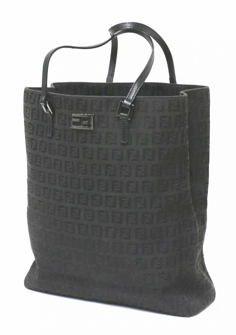 FENDI BLACK MONOGRAM CANVAS & LEATHER TOTE BAG: Fendi shoulder tote in black mini monogrammed canvas, thin black leather straps, dark silver tone hardware, top opening to black lined divided interior, single zipper opening to full length pocket bet