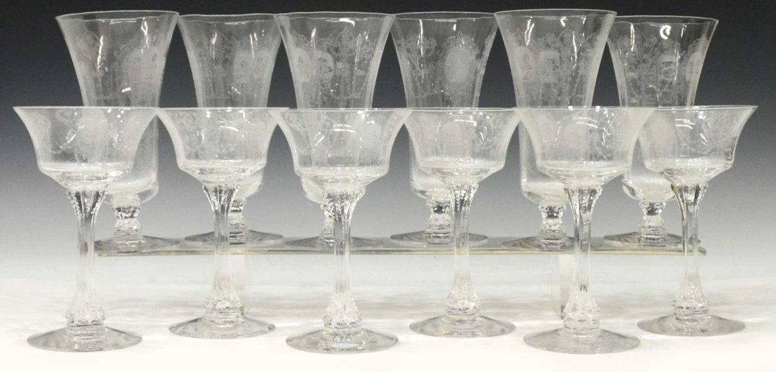 (12) HEISEY MINUET ETHCED GLASS STEWARE: (lot of 12) Heisey colorless etched glass stemware, "Minuet" pattern, including: (6) stemmed iced tea tumblers, approx 6.75"h, 3.5"diam; accompanied by (6) champagne / tall sherbet glasses, approx 6.2