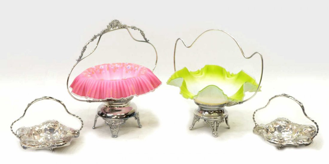 (4) VICTORIAN ART GLASS & SILVERPLATE BASKETS: (lot of 4) American Victorian brides baskets and silver plate table baskets: (1) plated Aesthetic and floral decor frame with pierced crane motif on each legs, set with a fold over ruffled rim pink sa