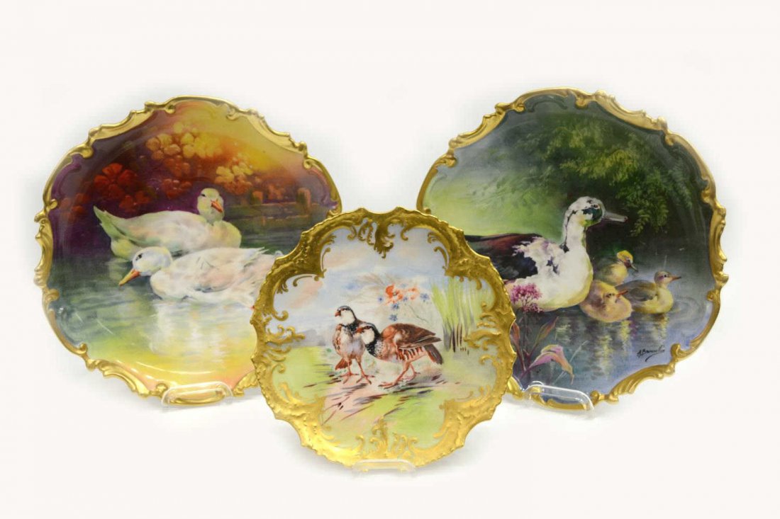 (3) LIMOGES PORCELAIN BIRD CHARGERS, A. BRONSILLON: (lot of 3) French porcelain chargers and cabinet plate: (pair) large Limoges porcelain wall chargers, Ducks, signed A Broussillon (Alfred Bronssillon, French master artist) each having scalloped gilde