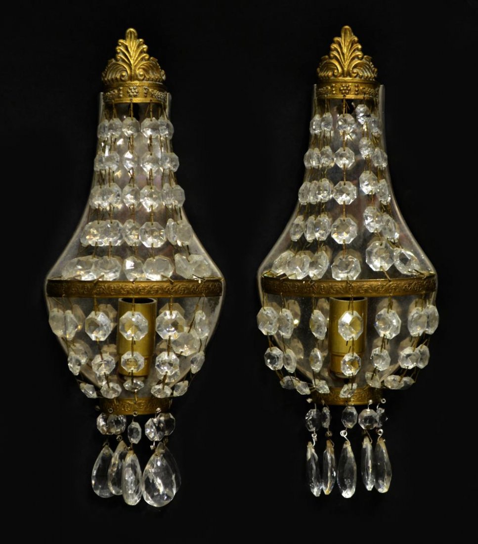 (2) CONTINENTAL BASKET FORM PRISM WALL SCONCES: (pair) Continental wall sconces, gilt metal frame hung with faceted hexagonal prisms, enclosing one light each, in need of wiring, 13"h, 5.5"w, 3"d Start Price: $80.00