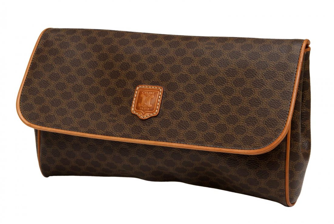 CELINE BROWN MACADAM MONOGRAM CANVAS CLUTCH: Celine Paris clutch in brown macadam monogram canvas, brown leather trim and accents, gold tone hardware, magnetic snap closure opening fold to exterior single zip pocket, main slip pocket with tan li