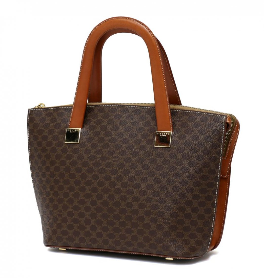 CELINE BROWN MACADAM MONOGRAM CANVAS HANDBAG: Celine handbag in brown macadam monogram canvas, tan leather trim and handles, gold tone hardware, single zipper opening to tan lined interior with zip side pocket and large cell pocket, bag: approx 8
