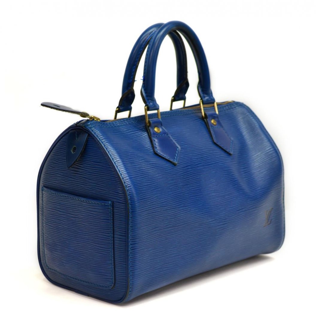 LOUIS VUITTON BLUE EPI LEATHER SPEEDY HANDBAG: Louis Vuitton "Speedy" handbag blue Epi leather, exterior slot pocket, interior with with hanging fabric pocket, double leather handles, single zipper closure, accompanied by lock and key, some wear t