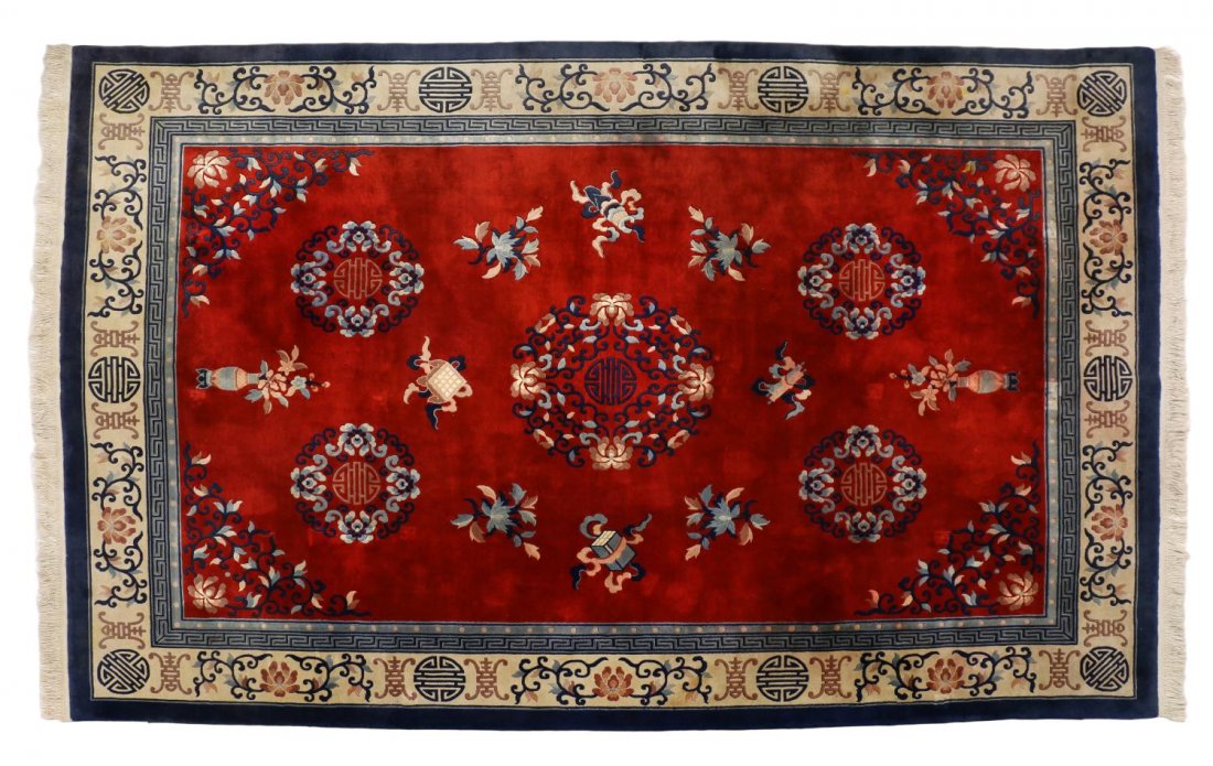 CHINESE SCULPTURED RUG, 13'5.5"l x 9'5"w: Chinese sculptured rug, a red center ground with Buddhist symbols, Shou character, flower and scroll motif throughout, some stains and discoloration, approx 13’5.5”l, 9’5”w Start Price: $200.0