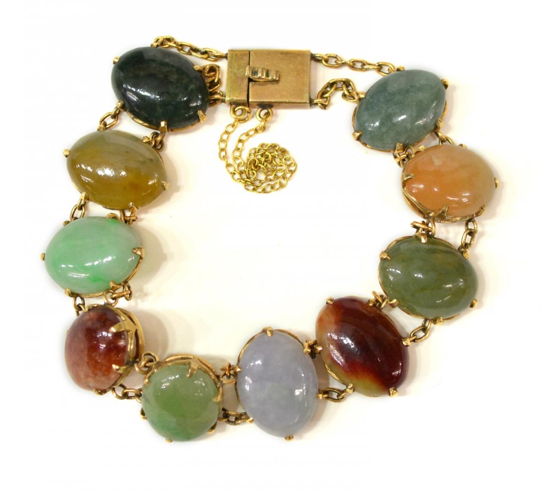 CHINESE 14KT GOLD & MULTI-COLOR JADE BRACELET: Ladies estate 14kt gold (tested) and multi-color jade bracelet, oval cabochon cut green, lavender and celadon color jade set along band, safety chain, approx 2.5"w (interior), 20.2 grams (all inclusiv
