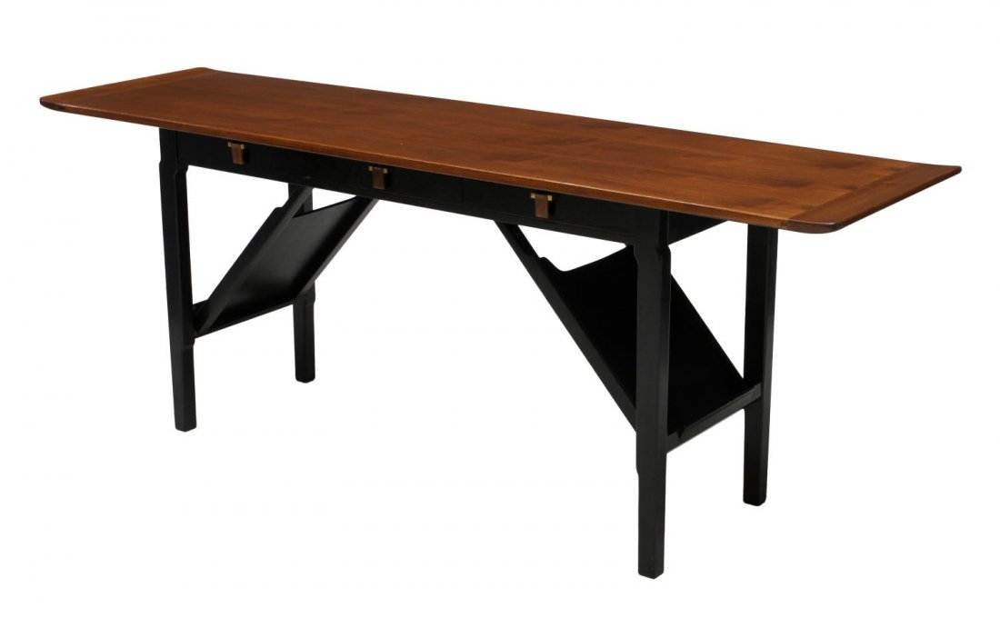 SCARCE DUNBAR TEAK & EBONIZED SERVER SIDE TABLE: Dunbar writing table, server or sofa table, design by Edward Wormley (American, 1907-1995), the rectangular teakwood top, slightly raised at each end, over the ebonized base with three frieze drawers,