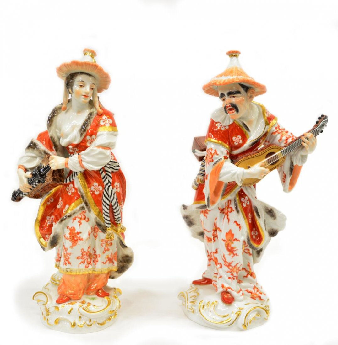 (2) MEISSEN PORCELAIN MALBAR MUSICIANS AFTER MEYER: (pair) Large Meissen Malabar musicians, late 19th / early 20th c., after the models by F.E. Meyer, each in wearing straw hat with parcel gilt fur-lined cloaks over decorated robes, female figure with 