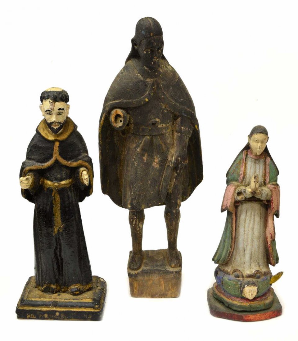 (3) ANTIQUE RELIGIOUS COLONIAL SANTOS FIGURES: (lot of 3) Spanish colonial carved wood religious figures, 19th c., each with remnants of polychrome decor, one with a marked base, largest 18"h, 5.5lbs total Start Price: $100.00