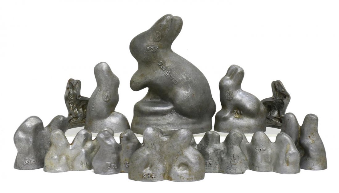 (11) ANTIQUE / VINTAGE BUNNY CHOCOLATE MOLDS: (lot of 11) Collection of German rabbit chocolate molds, marked Ges Gesch patent mark and mold number, comprising: (1) large rabbit on pedestal, 927, 9.5"h; (1) upright rabbit, 843, 5.5"h; (2) sitting