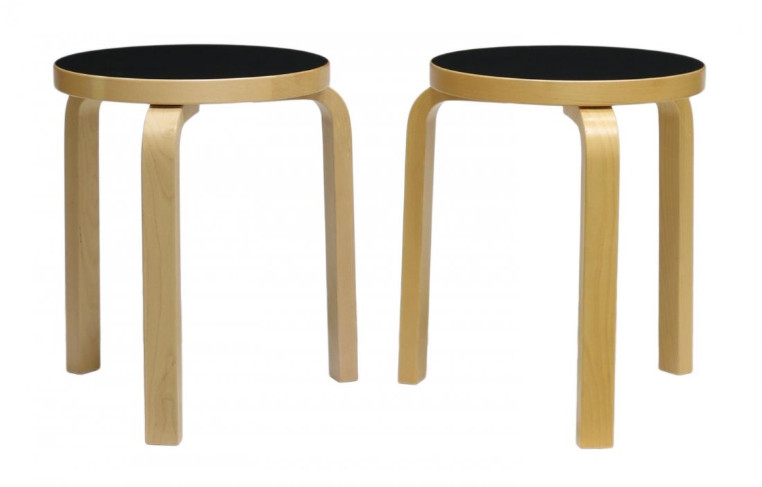 (2) ALVAR AALTO CIRCULAR OCCASIONAL TABLES: (lot of 2) Stools #60, the 1933 design by Alvar Aalto (Finland, 1898-1976) for Artek, a circular birch top with inset black finish rising on three squared legs, 17.5"h, 15"w, 15"d Start Price: $100.00