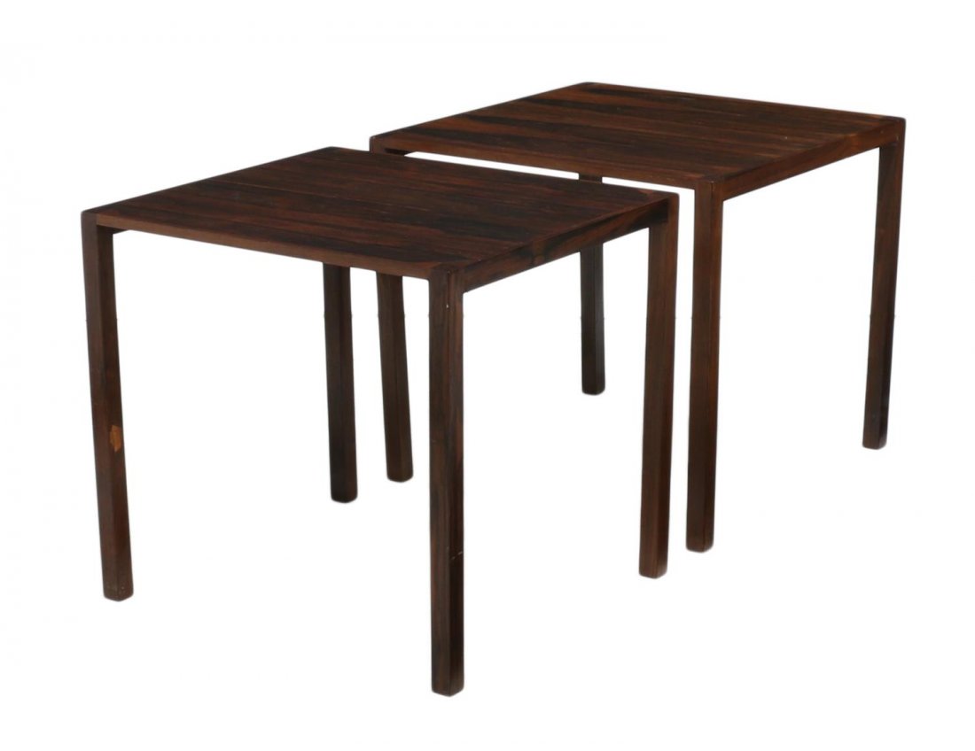 (2) DANISH MID-CENTURY MODERN ROSEWOOD NEST TABLES: (lot of 2) Danish mid-century modern rosewood nesting tables, by Mogens Kold's MÃ¸belfabrik, Copenhagen, 1960's, the square top rising on squared legs, makers tag at underside, largest: 20.25"h, 21.