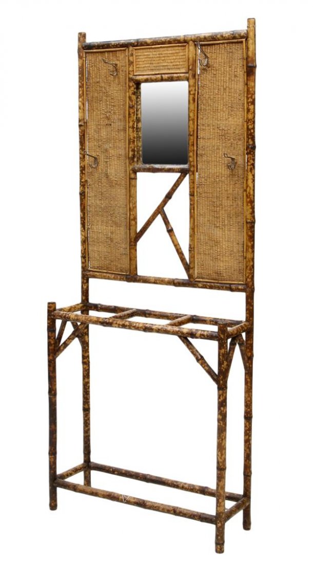 EARLY 20TH C. BRITISH BAMBOO HALL TREE: Bamboo hall tree, England, early 20th c., a central mirror, four coat hooks, lower umbrella rack, crack at bamboo in back, 74"h, 30.5"w, 10"d Start Price: $50.00