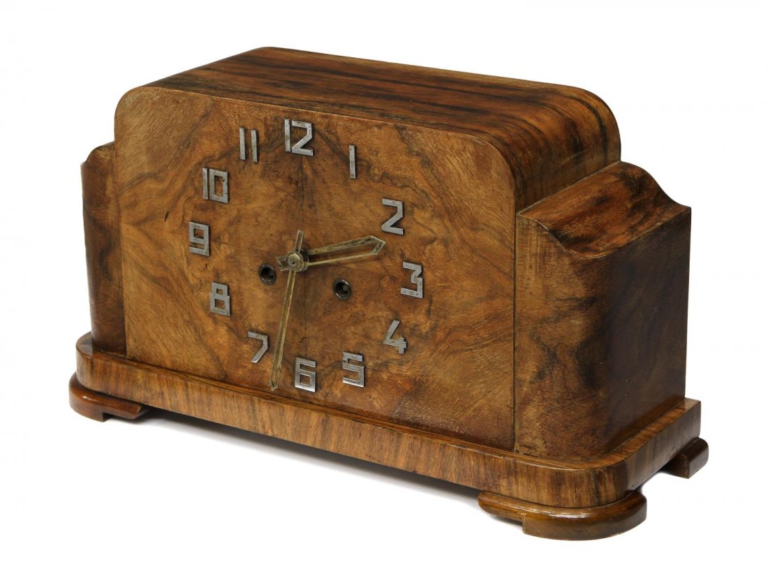 GERMAN MAUTHE ART DECO BURLWOOD MANTLE CLOCK: German Mauthe Art Deco mantle clock, wooden case with silver tone Arabic numerals, time and strike movement, Mauthe Made in Germany label to back, interior door marked 22 Juin 1933, accompanied by key