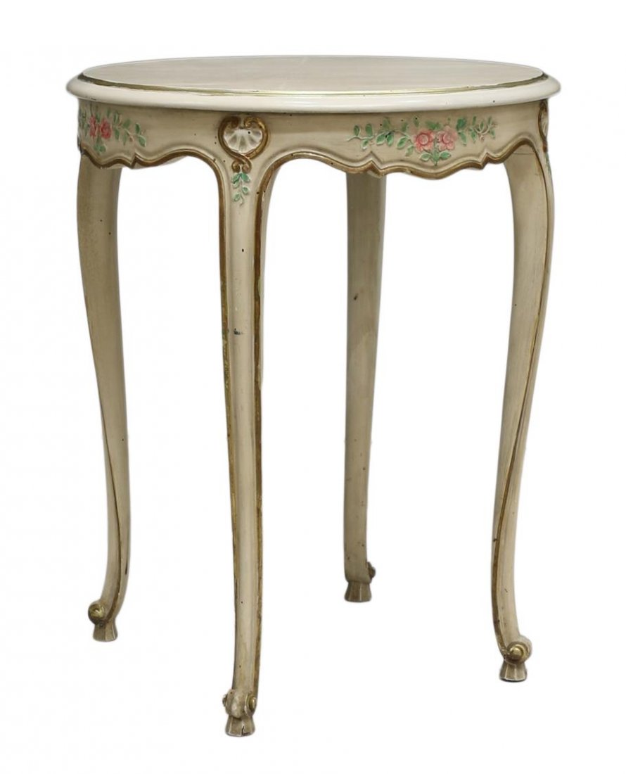FRENCH LOUIS XV STYLE PARCEL GILT SIDE TABLE: French Louis XV style parcel gilt side table, the painted table with circular top, over floral carved apron, raised on long cabriole legs, ending in a scrolled toe, approx 29"h, 23"w Start Price: $60.