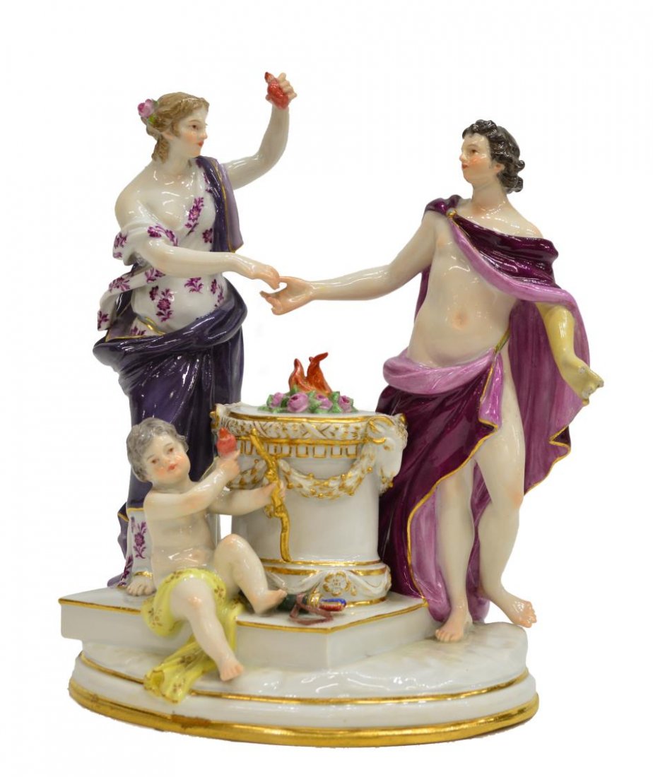 MEISSEN PORCELAIN FIGURAL GROUP, FLAMING HEART: Meissen porcelain figural group, 19th / 20th c., robed Classical figures standing on an oval base, the lady with outstretched arm clutching a flaming heart, her other hand extended over a fiery altar 