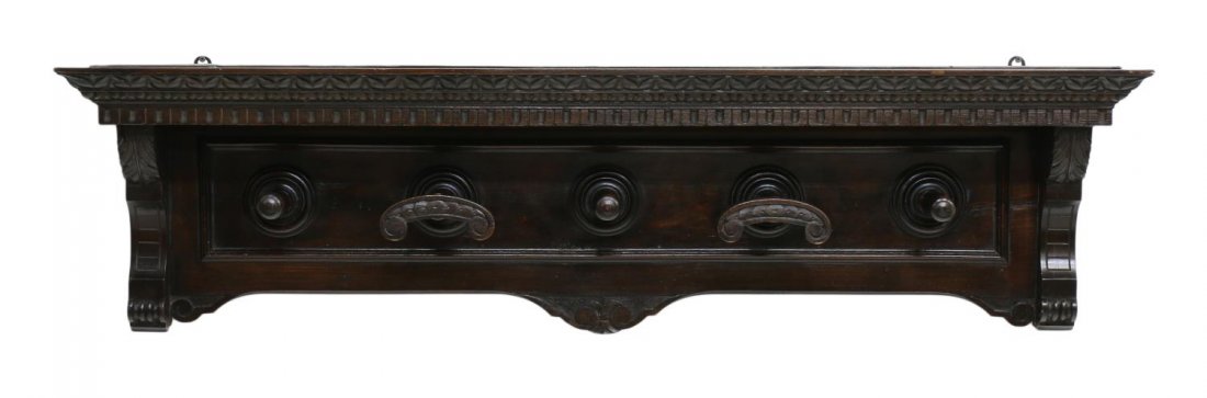 RENAISSANCE REVIVAL CARVED HANGING HALL RACK: Renaissance Revival carved hall rack, 19th c., ornamental carving over five carved hooks, approx 14"h, 54.75"l, 8"d Start Price: $80.00
