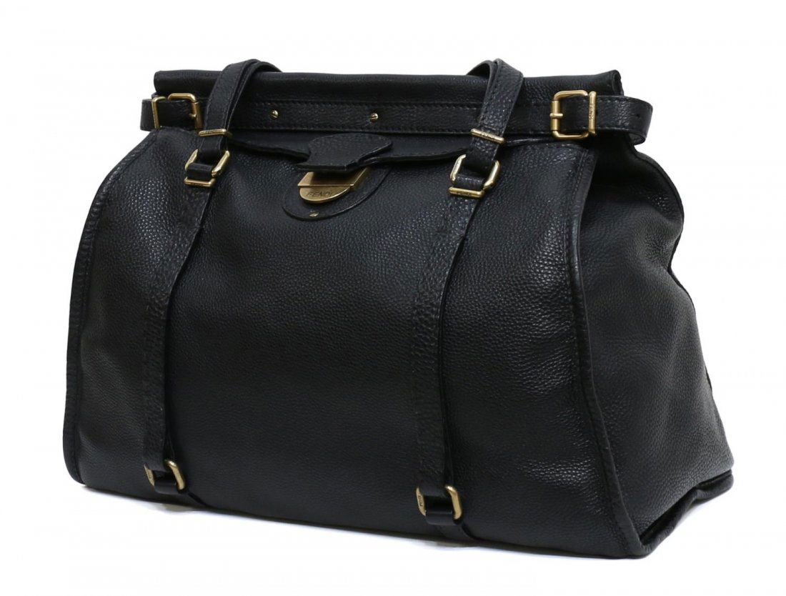 FENDI SELLERIA BLACK GRAINDED LEATHER PURSE: Fendi "Selleria" handbag in black grained leather with two adjustable straps, gold tone hardware and clasp, fold over top opens to brown canvas interior featuring two slip and one zipper pocket, small