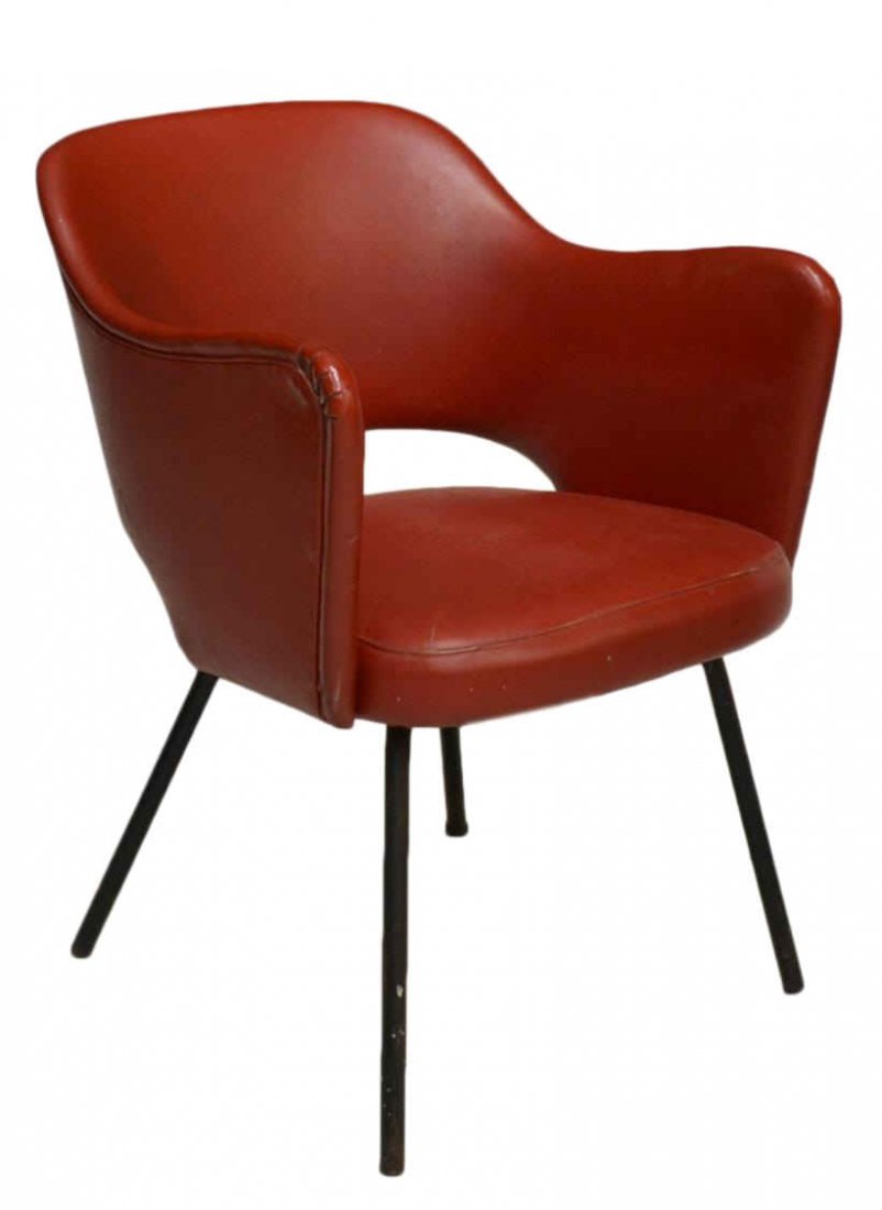 ITALIAN MID-CENTURY MODERN RED UPHOLSTERED CHAIR: Italian mid-century modern upholstered arm chair, c. 1960, raised on tubular black steel legs, small split to upholstery one corner, approx. 28.75"h, 21.25"w, 18"d Start Price: $80.00