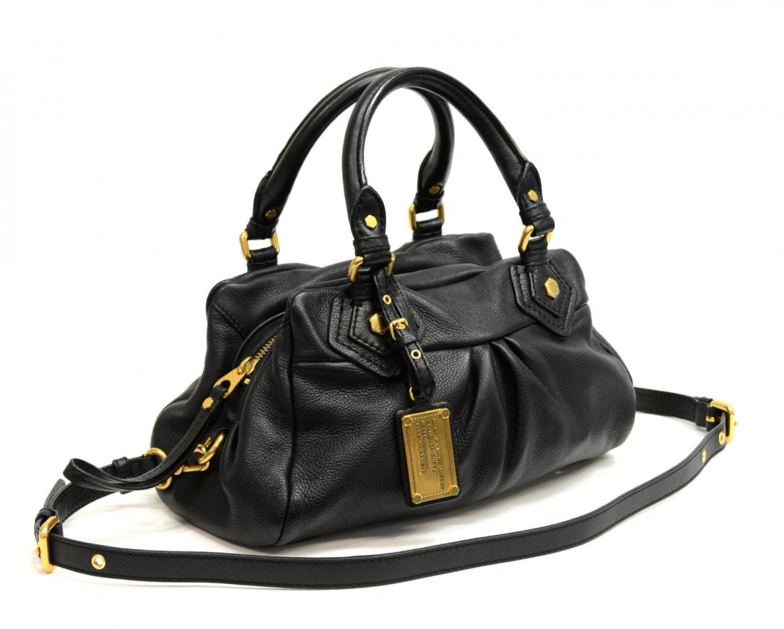 MARC JACOBS BLACK GRAINED LEATHER PURSE: Marc by Marc Jacobs black grained leather handbag with two leather straps, gold tone hardware and zipper, embossed gold tone tag, cloth lined interior with two slip and one zipper pockets, dust bag, i