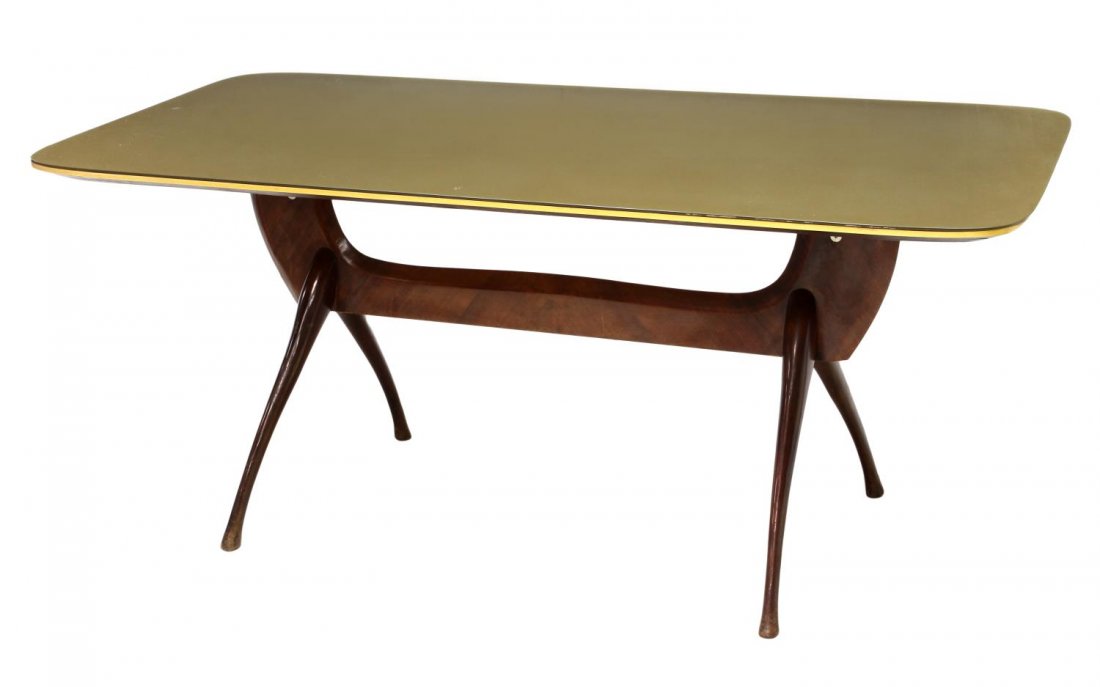 ITALIAN DESIGN GLASS TOP TABLE, VITTORIO DASSI: Mid-century modern wood and glass top dining table, design attributed to Vittorio Dassi (Milan, 1893-1973), stretcher base and shaped legs supporting a large glass top with greenish-gold painted under