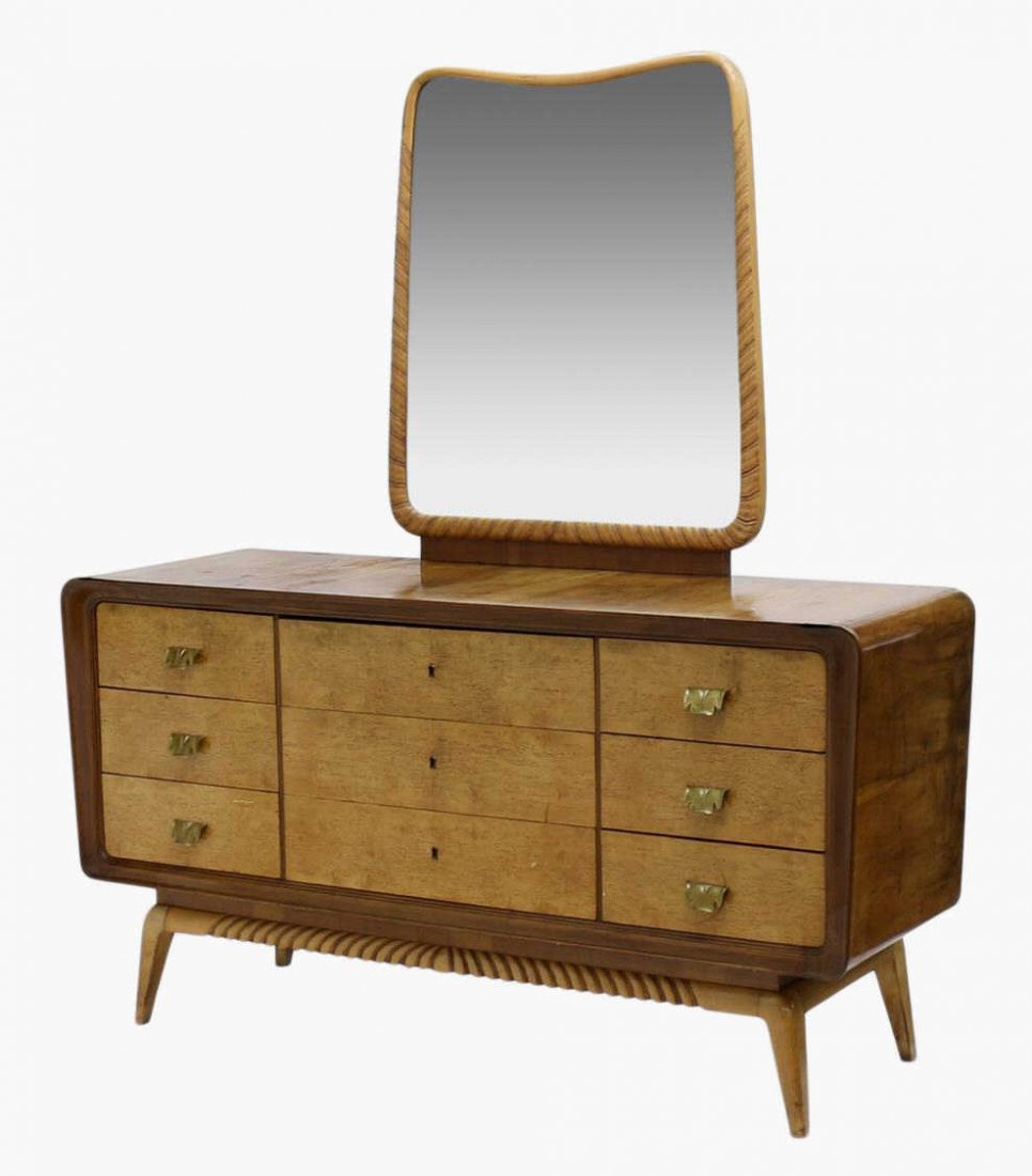 ITALIAN MID-CENTURY MODERN MIRRORED COMMODE: Italian mid-century modern mirrored commode, 1950's design attributed to Vittorio Dassi (Milan, 1893-1973), the mirror frame with contrasting wood over the top, nine maple faced drawers, rising on tap
