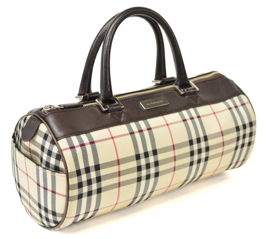 BURBERRY CLASSIC CHECK TARTAN BARREL PURSE: Burberry "Classic Check" tartan purse of barrel form, exterior silver tone tag with slot pocket to either side, dark brown handles and trim, accompanied by dust bag, 5.75"h, 12"l, 1lb Start Price: $15