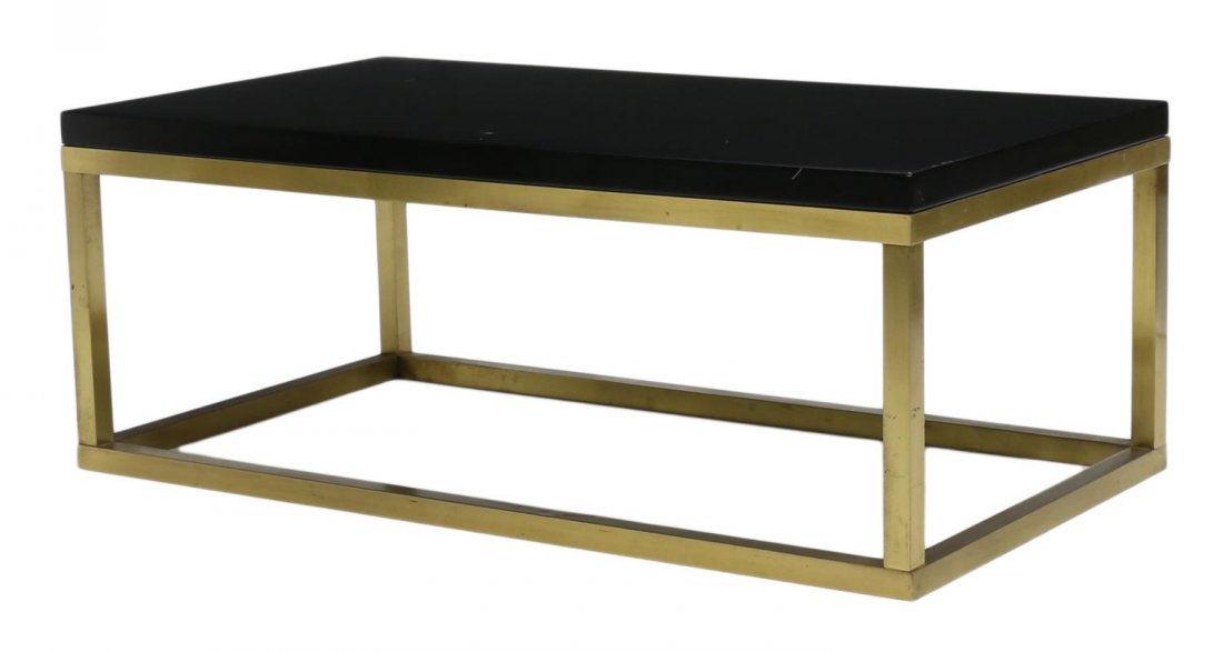 FRENCH MODERN DESIGN FORMICA & METAL COFFEE TABLE: French modern design coffee table, 20th c., having a black formica top and metal frame, approx 16.5"h, 43.25"l, 23.5"d Start Price: $150.00