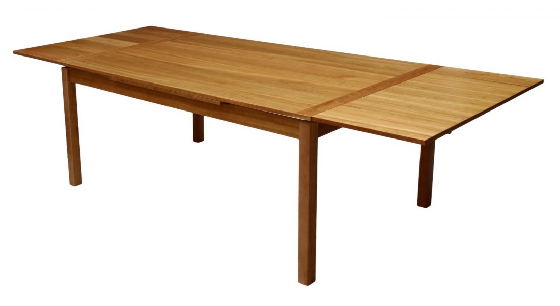 DANISH MODERN ANSAGER DRAW LEAF DINING TABLE: Danish modern cherrywood dining table by Ansager Mobler, late 20th c., rectangular with draw leaves, raised on squared legs, with leaves open: 111"l, with leaves closed: 30"h, 72"l, 41.5"d Start Price