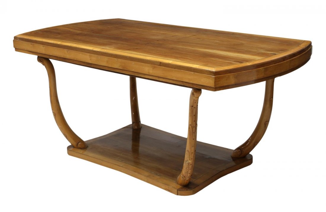 ITALIAN MID-CENTURY MODERN DINING TABLE: Italian mid-century modern dining table, 1950's, having a rectangular top with two curved ends, rising on stylized dolphin like supports on a smaller conforming base with block feet, 33"h, 72"w, 37.5"