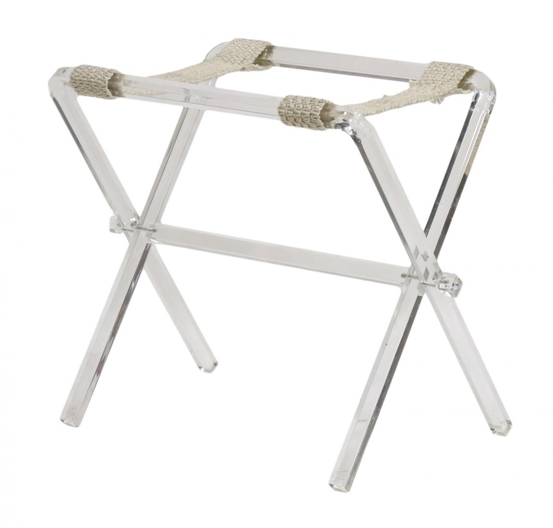 MODERN TRANSLUCENT FOLDING LUGGAGE RACK: Translucent folding plastic luggage rack, late 20th c., two braided straps, open: 21.5"h, 25.75"w, 16"d, folded: 26.25"h, 25.75"w, 2.5"d, 7lbs Start Price: $40.00