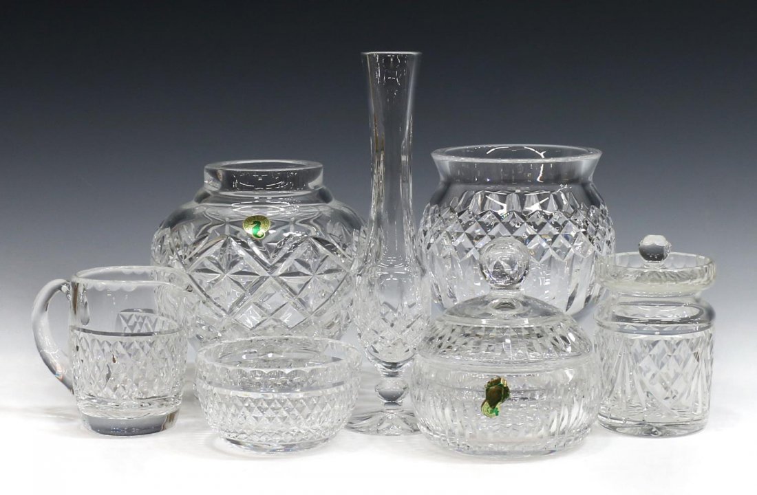 (7) COLLECTION OF WATERFORD CRYSTAL VASES, JARS: several retaining label, including: (2) creamer and sugar, diamond pattern, 4"h; (1) small lidded condiment jar, 4"h; (1) covered jar / dish, 5"h; (1) "Lismore" bud vase, 9.25"h; (1) footed vase with 
