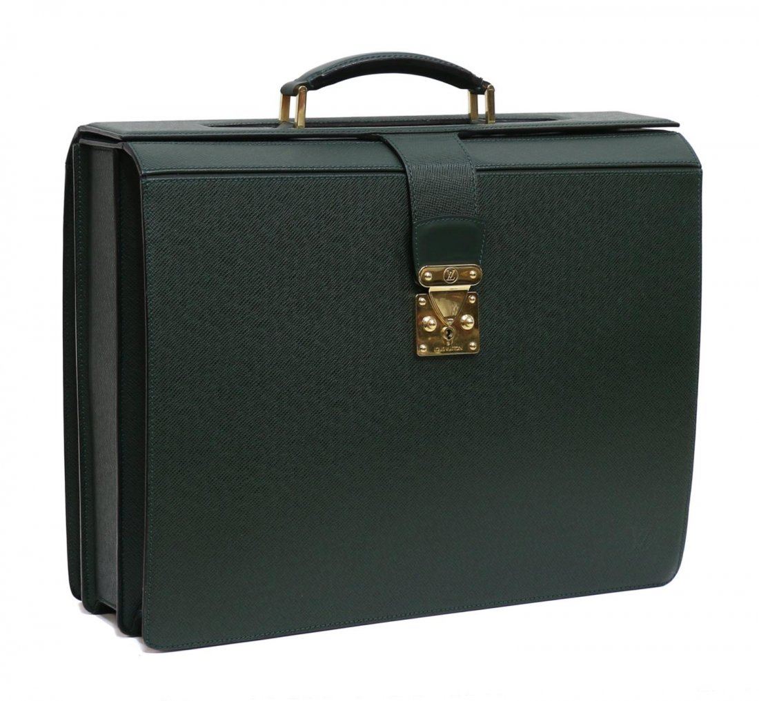 LOUIS VUITTON GREEN TAIGA LEATHER BRIEFCASE: Louis Vuitton 'Pilot' briefcase in green Taiga leather, single slot pocket on the exterior, small zipped pocket on the interior flap top with leather handle and gilt metal hardware, multiple slots and