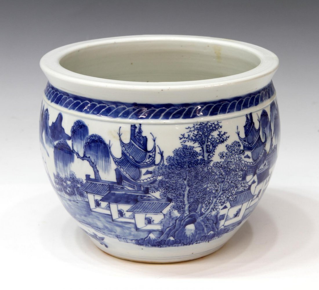CHINESE UNDERGLAZE BLUE & WHITE PORCELAIN PLANTER: Chinese underglaze blue and white porcelain jardiniere, river and mountainous scene having houses and bridges with figures, unmarked, minor chip to rim, approx 6.75"h, 8.25"diam; 4lbs total Start Pric