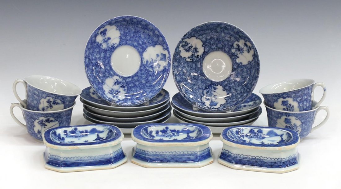 (18)CHINESE EXPORT UNDERGLAZE BLUE AND WHITE WARE: (lot of 18) Chinese export underglaze blue and white porcelain ware, comprising: (3) Canton salt cellars, mountain and house scene on river, glaze loss to the edges, 1.25"h, 4"l, 3"w; (4) teacups, flo