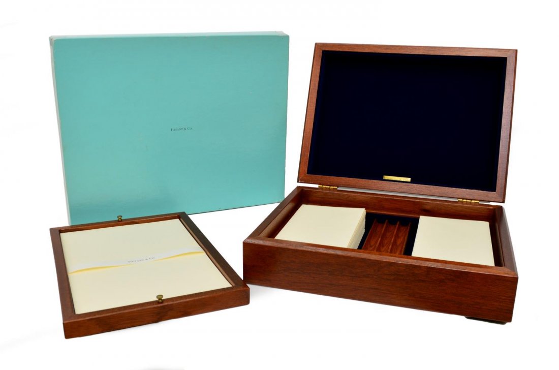 TIFFANY & CO 'KENT' CHERRYWOOD CORRESPONDENCE BOX: Tiffany & Co. 'Kent' Correspondence or Stationery box, cherrywood with a hinged lid opening stationery on lift out tray revealing pen tray and envelope storage, housed in Tiffany blue box with worn co