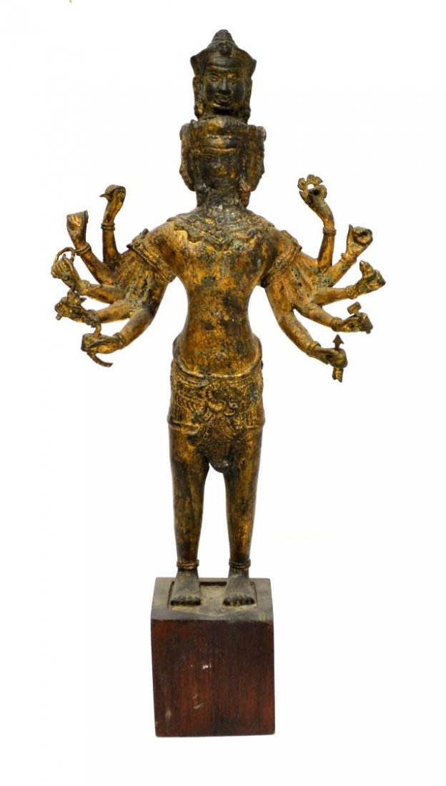 ANTIQUE THAI BRONZE MULTI-ARM BUDDHA: Antique Thai bronze multi-arm Buddha mounted on an integral stand, the ten arm figure with a Buddha head over four faces, overall: 17"h, 8,25"w, 3"d, 4lbs Start Price: $80.00