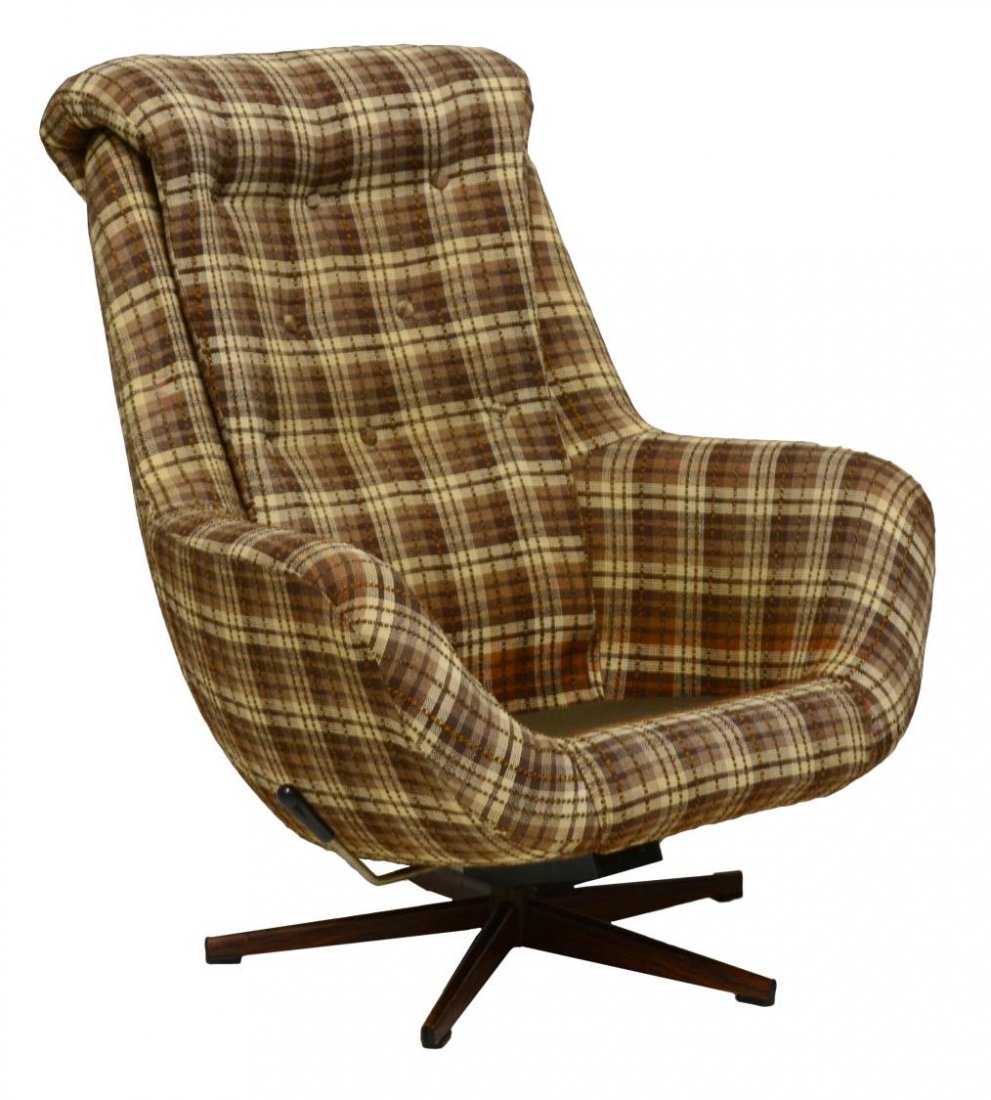 DANISH MODERN SWIVEL TILTING ARM CHAIR: Danish modern swivel tilting arm chair, c. 1970, having brown and plaid upholstery, a quadripartite steel base with wood grain covering, 36"h, 30.25"w, 24"d Start Price: 150.00
