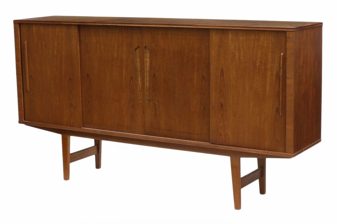 DANISH MID-CENTURY MODERN TEAKWOOD SIDEBOARD: Danish mid-century modern teakwood sideboard, c. 1950's / 1960's, sliding doors open to a fitted interior, rising on stretcher joined legs, some staining and loss, approx 43.25"h, 81.75"w, 17.25"d Sta