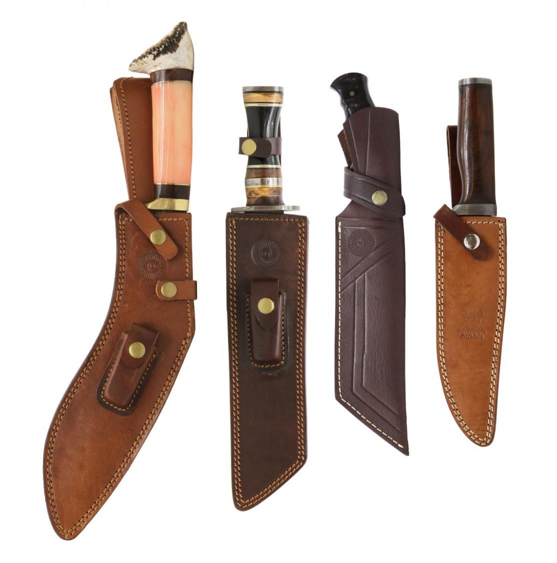 (4) DAMASCUS BLADE SHEATHED KNIVES: (lot of 4) Damascus blade knives: (1) Khukuri form with bone handle knife, blade approx. 12"l, overall: 18.,5"l, complete with A&G sheath; (1) cleaver 8" blade, moulded handle, leather sheath, overall
