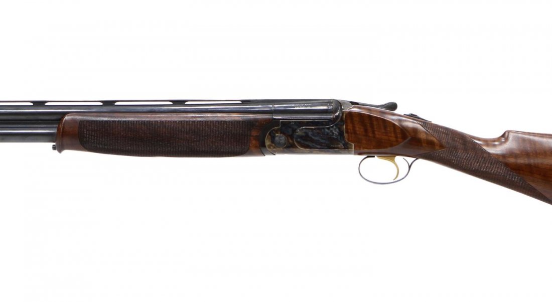 SIG ARMS ITALIAN OVER & UNDER 12 GAUGE SHOTGUN: Sig Arms Italian made TR20-U Aurora over and under shotgun, 12 gauge, 26.5" barrels with vent rib, single gilt trigger, fancy checkered stock, SN EX01XXX *FFL TRANSFER REQUIRED Start Price: $400.00