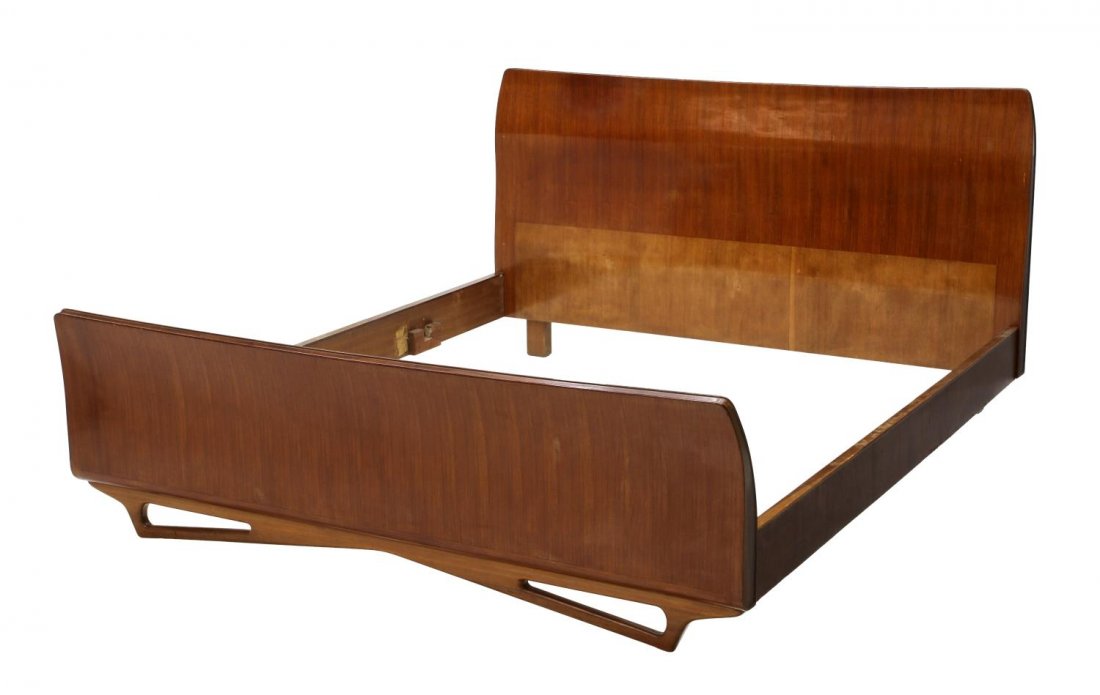CARLO DE CARLI ITALIAN MID-CENTURY MODERN BED: Italian mid-century modern rosewood bed, c. 1950, design by Carlo de Carli (Italy, 1910-1999), curved head and foot board, rising on angular shaped legs, retaining label to the back of headboard, appr