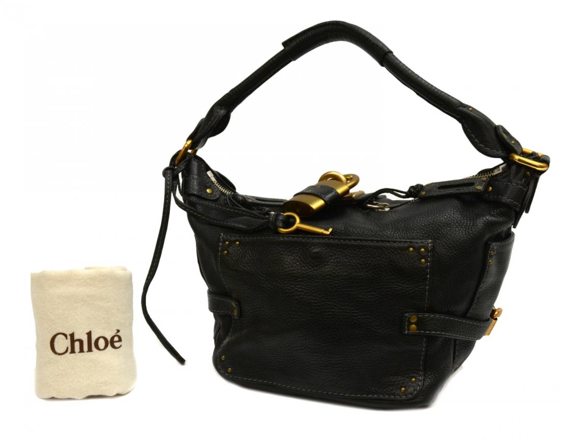 CHLOE BLACK GRAINED LEATHER PADDINGTON HOBO BAG: Chloe black grained "Paddington Hobo", single shoulder strap, two exterior slot pockets with snap closure, each end with open slot pocket, dual zippers open to cloth lined interior with small slot and