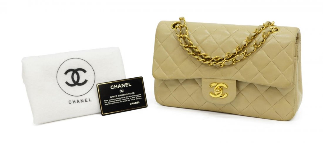 CHANEL BEIGE QUILTED LEATHER DOUBLE FLAP PURSE: Chanel beige quilted leather double flap purse with gold ton hardware, flap top with zippered pocket, front slot pocket, interior bag with two slots, retaining authenticity card and white dust bag, ba