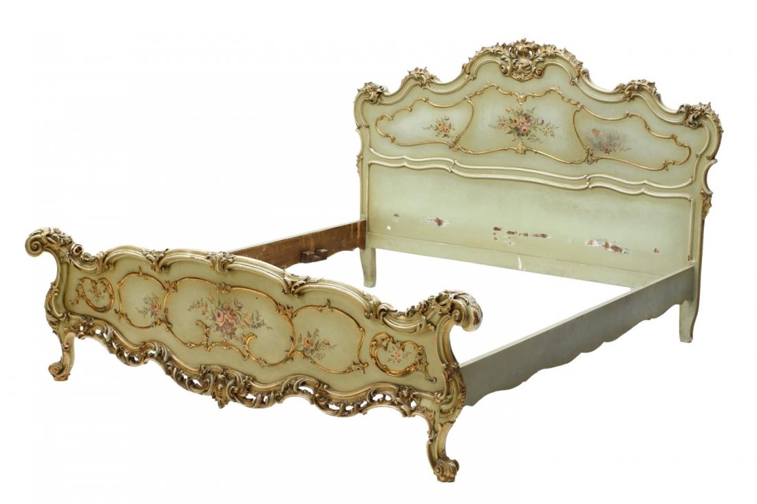 LOUIS XV STYLE BOMBE FLOWER PAINTED BED: Louis XV style bombe bed, early 20th c., elaborate rocaille trim to head and foot board, painted with flower bouquet on a green ground, rising on cabriole legs, some paint loss and edge loss, approx i