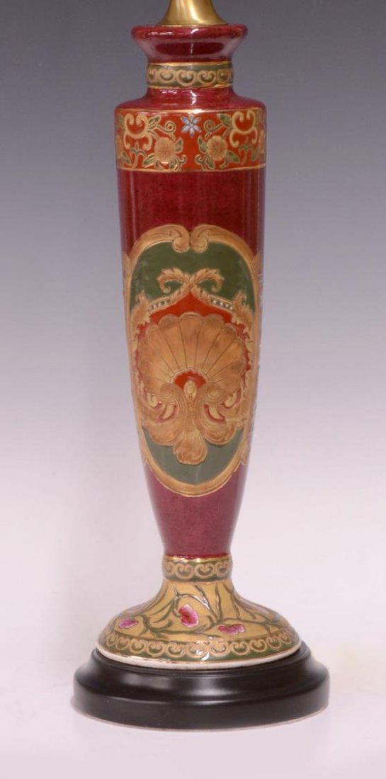 BURGUNDY COLORED PORCELAIN VASE LAMP: Burgundy colored porcelain vase, converted to one light table lamp, approx 21"h, 3lbs *Provenance: Estate of Howard Hand (Texas, New York, 1921-2011). A collector and seller of fine antiques for 75 ye