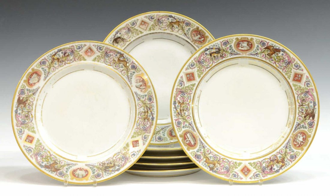 (7) SEVRES "FOUNTAINEBLEAU" PLATES: (lot of 7) Sevres porcelain dinner plates, 19th c., after the "Service Ordinaire de Fontainebleau" pattern, each having rims with polychrome animals amongst scrolling foliates, monogram LP reserves, m