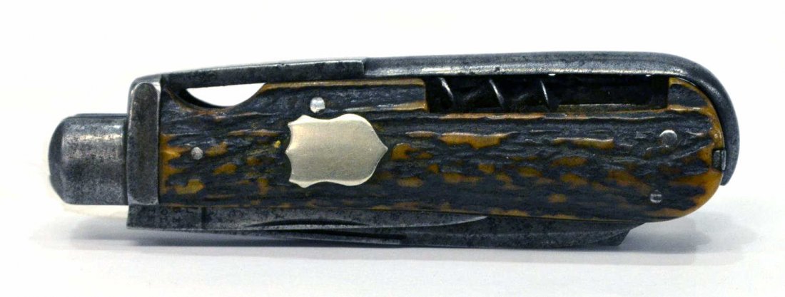 GEORGE WOSTENHOLM IXL MULTI-BLADE POCKET KNIFE: George Wostenholm, Sheffield, IXL pocket knife, three blades, corck screw, awl, drill and hoof pick, stag handle with shield, pick and tweezers, longest blade 3.25"l, Start Price: $60.00